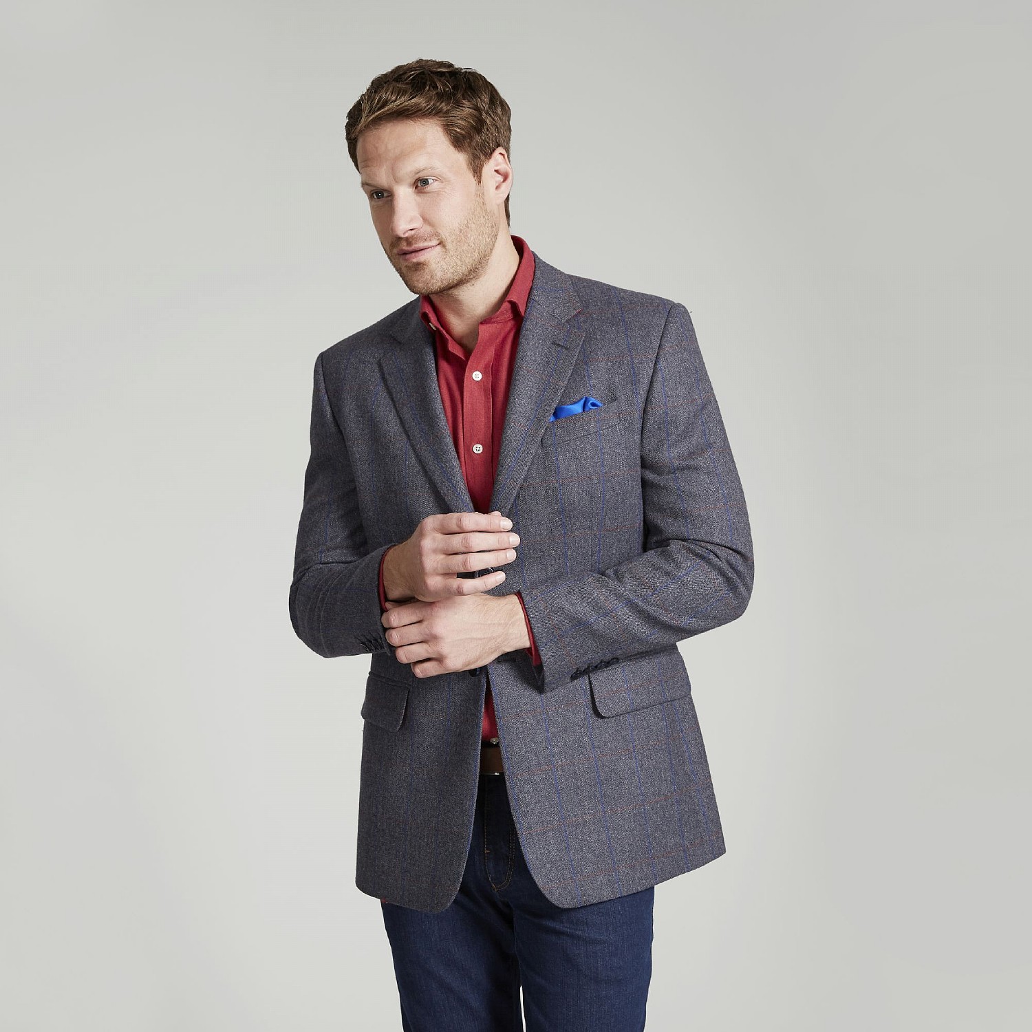 grey jacket red shirt