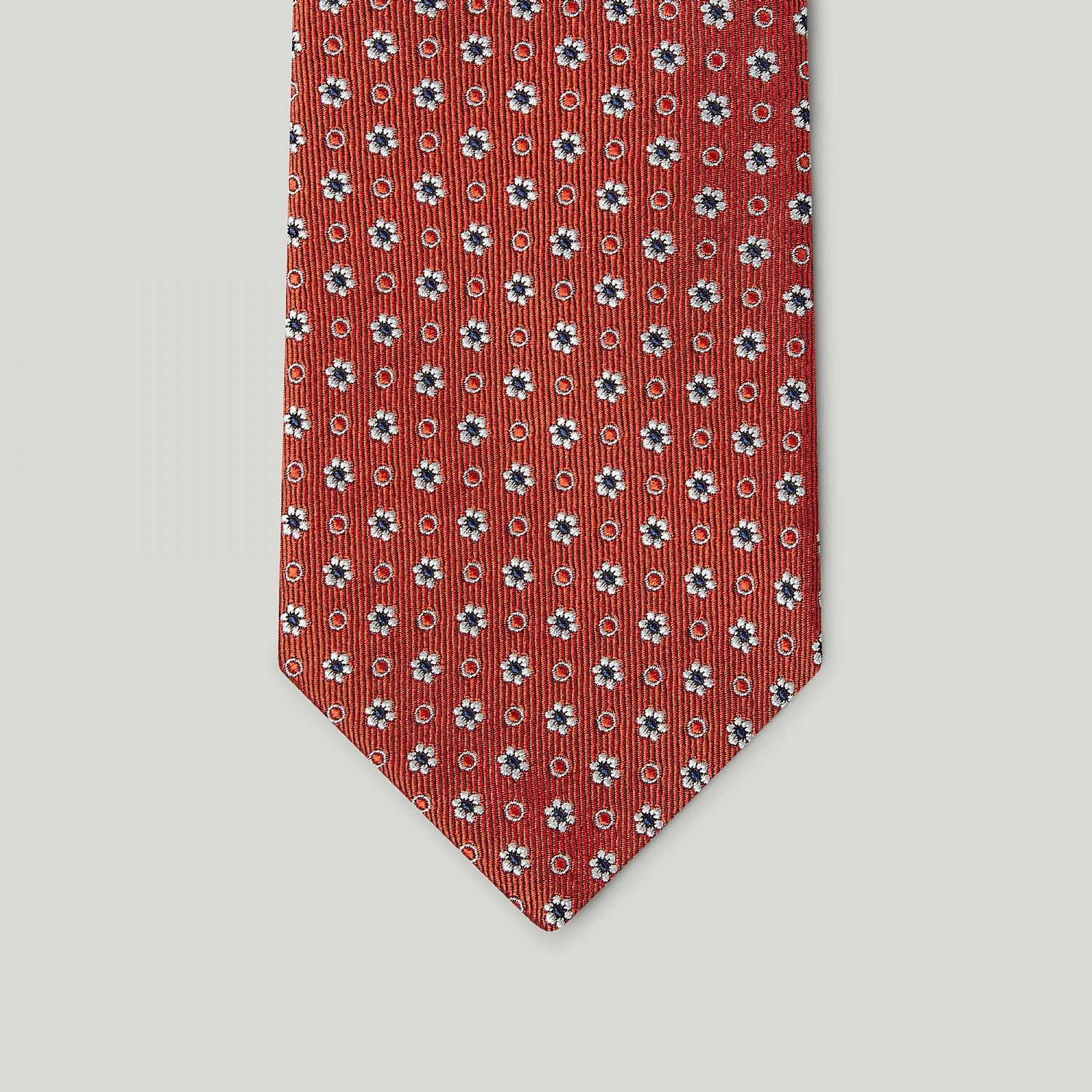 Orange flower and dot woven silk tie