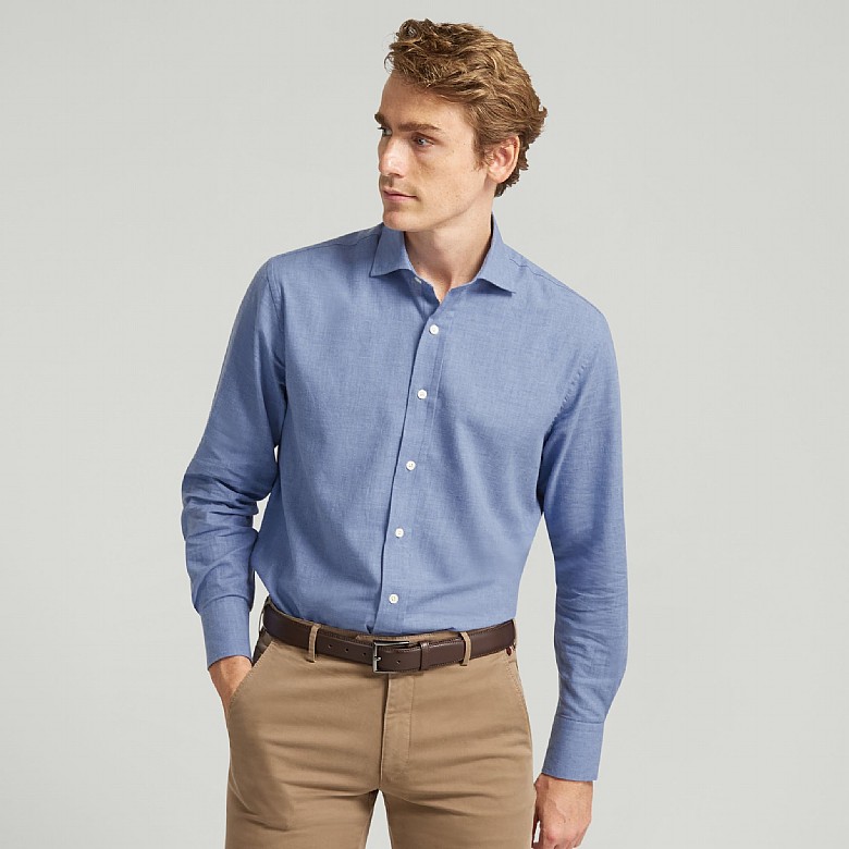 A sky blue pure cotton casual shirt with a semi-cutaway collar, shown flat.